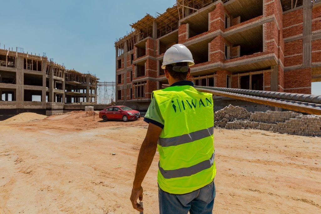 IWAN Developments, Leading real estate developer in Egypt, construction vest.